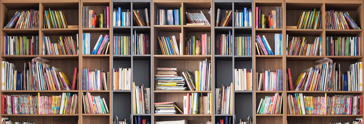 Books scattered on a bookshelf